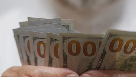An Elderly Bearded Man's Hands Counting Dollars Banknotes 스톡 동영상 92561085