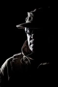 Elderly commando fighter studio portrait on black Stock Photos