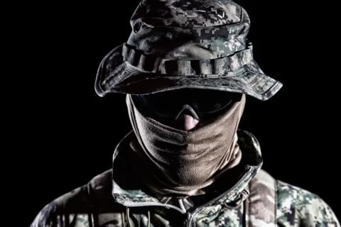 Elderly commando fighter studio portrait on black Stock Photos