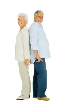 Elderly couple back to back Stock Photos