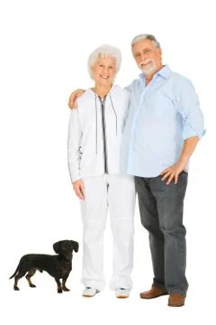 Elderly couple with a dachshund Stock Photos