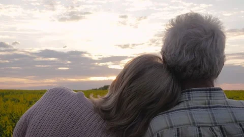 Elderly Couple Enjoys Sunset View Woman Puts Head On Husbands Shoulder Stock Footage 243646675