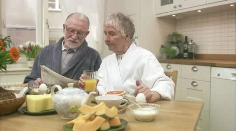 An elderly couple having breakfast Video stock 11336719