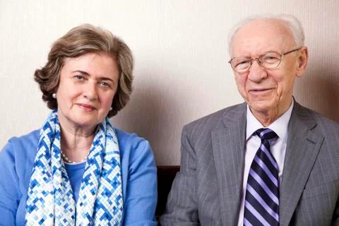 Elderly couple looking at camera Stock Photos