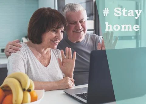 Elderly couple looking at computer during the pandemic coronavirus Stock Photos