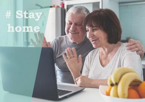 Elderly couple looking at computer during the pandemic coronavirus Stock Photos