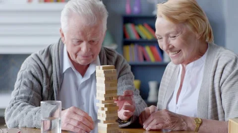 Elderly couple playing Board games Stock Footage 63419782