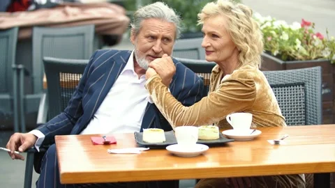 Elderly couple sitting at the table Stock-Footage 141678068