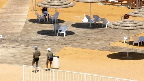Elderly Couple Taking Mud Treatments on One of the Dead Sea Beaches Stock Footage
