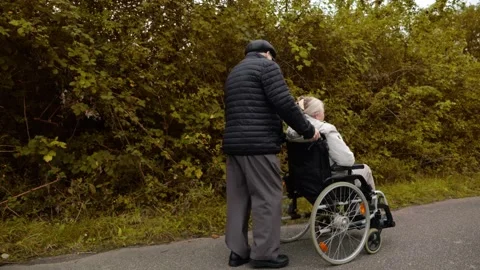 Elderly couple taking a walk Stock Footage 318072220