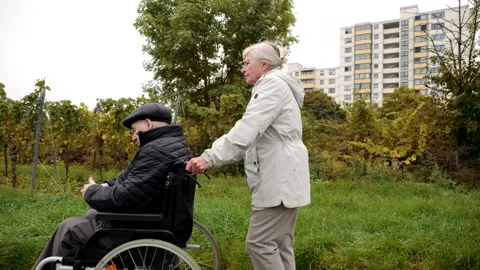 Elderly couple taking a walk Stock Footage 318072222