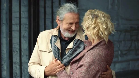 An elderly couple walking the streets Video stock 144635169