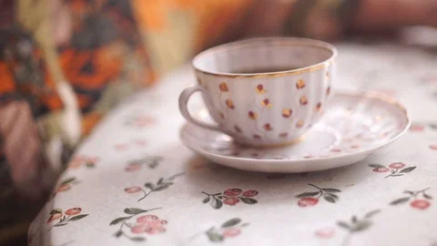 Elderly with a cup of tea. Old hands with a cup of tea. Stock Footage 102760634