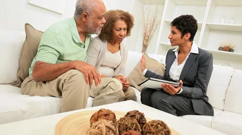 Elderly Ethnic Couple Meeting Financial Advisor Home Stock Footage