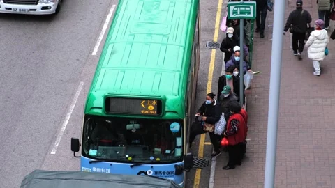 Elderly getting on board a mini-bus in Hong Kong, public transport Stock Footage 252955700