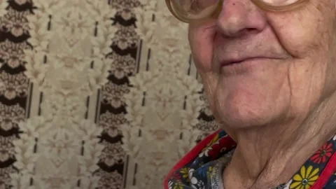 An elderly gray-haired lady of 90 years of age Stock Footage 194577382