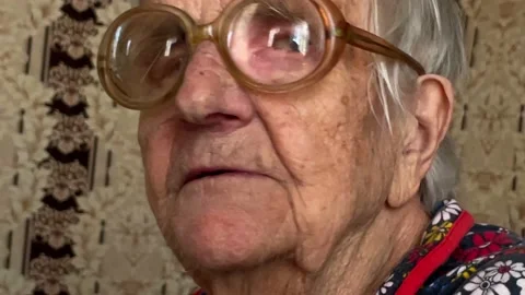 An elderly gray-haired lady of 90 years of age Stock Footage 194577383