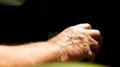 Elderly hand on a manual gear shift. Stock Footage 341109805