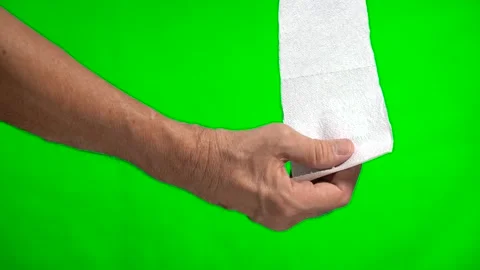 Elderly hands rip off a piece of mass-produced toilet paper Video stock 159977342