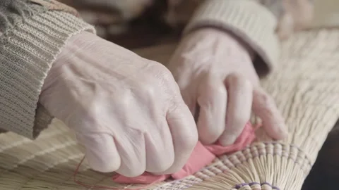 Elderly Hands Sewing Decorations on Bon Odori Hat in Ugo Town, Akita, Japan Stock Footage 340319897