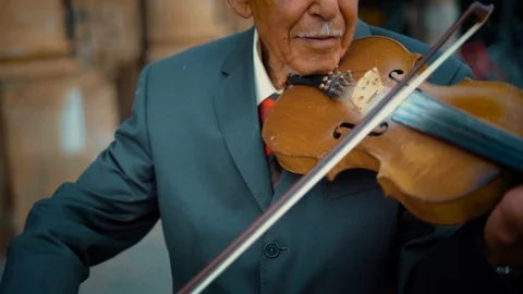 Elderly Hispanic Man Playing the Violin 2 Stock Footage 87676640