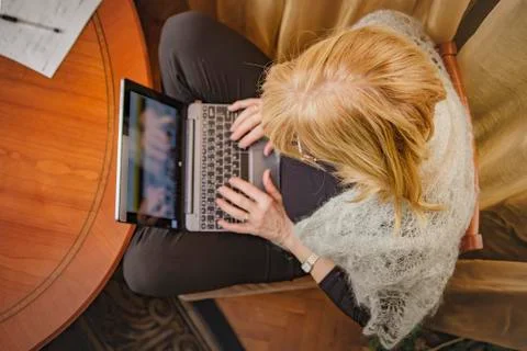 Elderly lady browsing internet Stock Photos