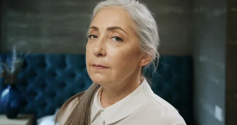 Elderly Lady Looking to Camera 動画素材 112455560