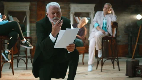 Elderly male actor rehearse the script o... | Stock Video | Pond5