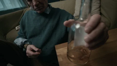 Elderly Man Abusing Alcohol and Slamming Fist on Table 스톡 동영상 300596451