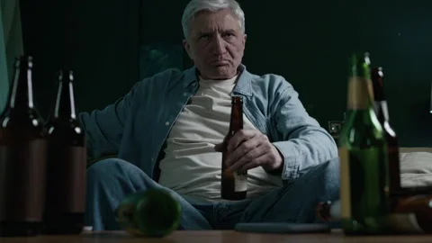 Elderly Man Abusing Alcohol While Watching TV at Home Alone 스톡 동영상 300602113