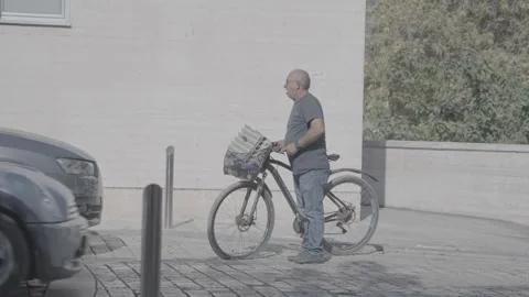 An elderly man on a bicycle in Paphos, Cyprus Video stock 344056664