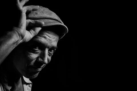 An elderly man in a cap. Stock Photos