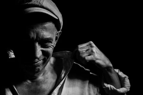 An elderly man in a cap. Stock Photos