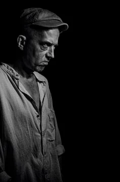 An elderly man in a cap. Stock Photos