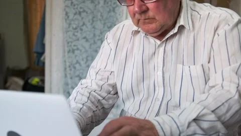 Elderly Man Carefully Types Learning, Senior Caucasian Male Focused On Practici Stock Footage 326863824