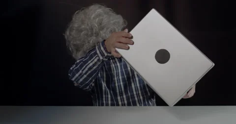 An elderly man does not know how to use the computer. Stock Footage 163314665