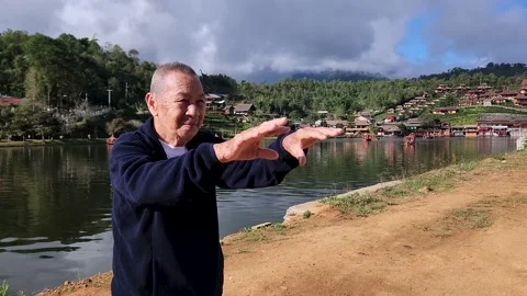 An elderly man  doing exercise. Aging lifestyle for good health concept. Stock Footage 228665570