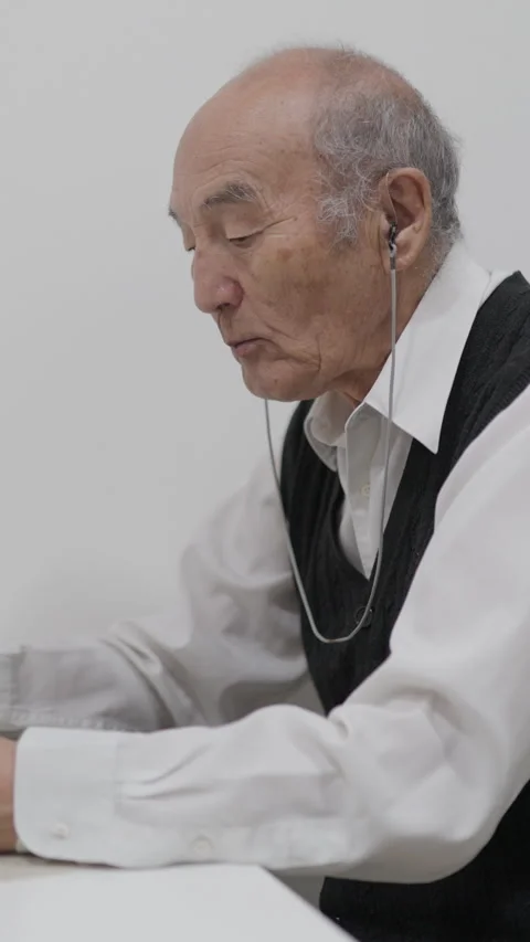 Elderly man enjoying a cup of coffee and biscuits Stock Footage 327230960