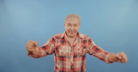 Elderly man expressing excitement Stock Footage 114130033