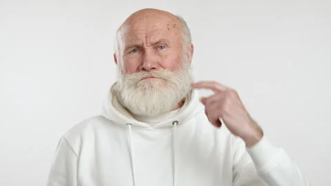 Elderly Man Gesturing Crazy with Finger to Head Stock Footage 263998868