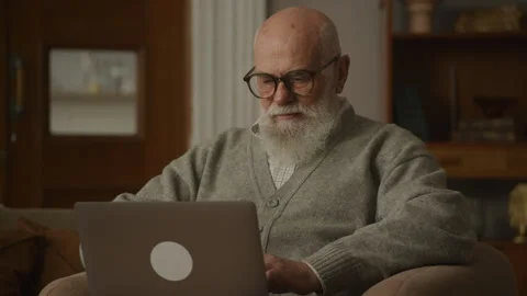 Elderly Man in Glasses Typing on Stock Video Pond5