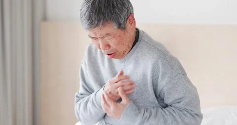 Elderly man has heart attack Stock Footage 147958183