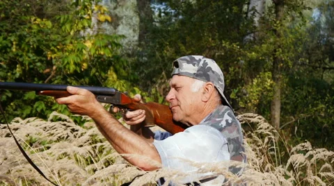 An elderly man on the hunt Stock Footage 66512700