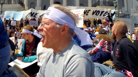Elderly man joins Democracy Spring sit-in at the U.S. Capitol. Stock Footage 62274348
