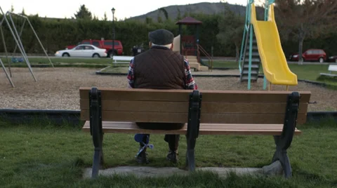 Elderly Man looking at Playground Stock Footage 37345330