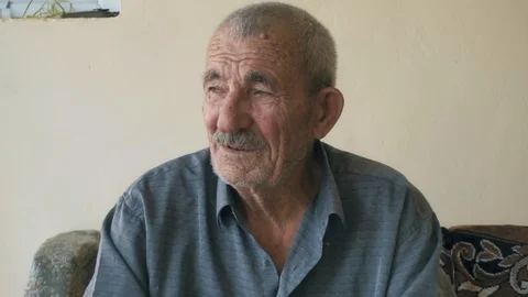 Elderly man looking sideways Stock Footage 95679645