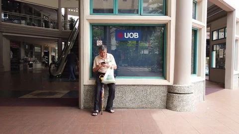 An elderly man at the mall. Stock Footage 105632992