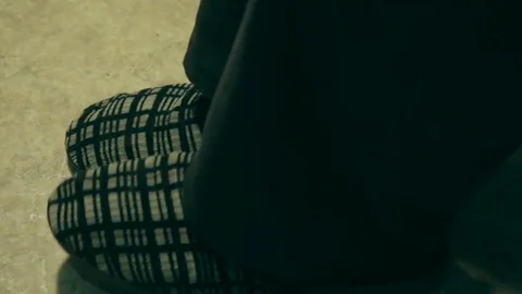 An elderly man in old slipers Stock Footage 69175878