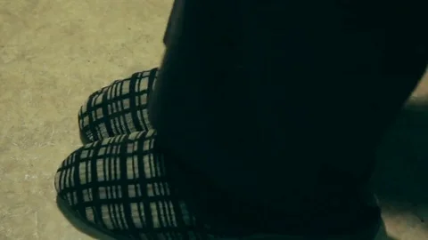 An elderly man in old slipers Stock Footage 69178285