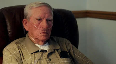 Elderly man on oxygen CU.mp4 Stock Footage 29998009